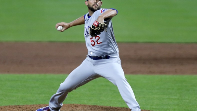 Jul 28, 2020; Cincinnati, Ohio, USA; Chicago Cubs relief pitcher Ryan Tepera (52) throws against the Cincinnati Reds during the ninth inning at Great American Ball Park. Mandatory Credit: David Kohl-USA TODAY Sports