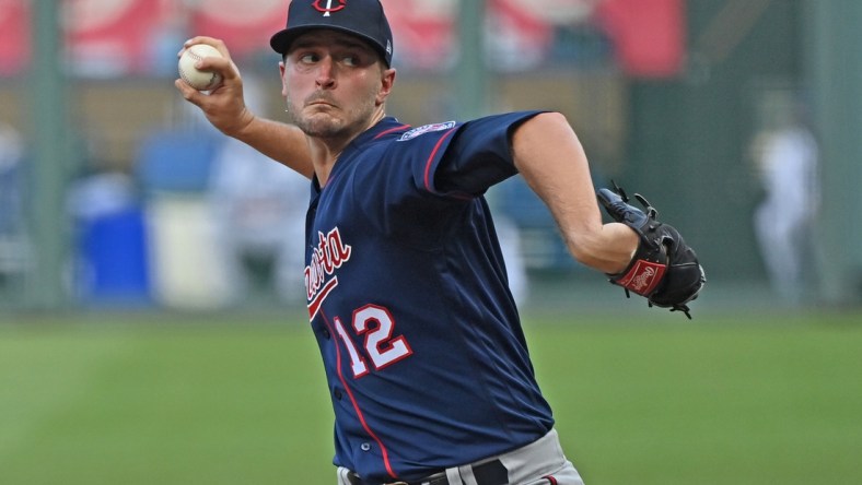 Aug 8, 2020; Kansas City, Missouri, USA; Minnesota Twins starting pitcher Jake Odorizzi (12) delivers a pitch during the first inning against the Kansas City Royals at Kauffman Stadium. Mandatory Credit: Peter Aiken-USA TODAY Sports