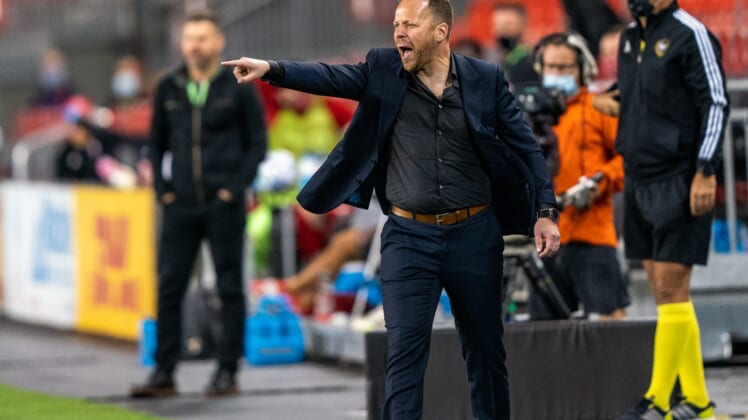 Aug 18, 2020; Toronto, Ontario, CAN; Vancouver Whitecaps head coach Marc Dos Santos yells from the sidelines against Toronto FC at BMO Field. Mandatory Credit: Kevin Sousa-USA TODAY Sports