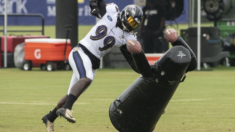 Aug 19, 2020; Owings Mills, Maryland, USA; Baltimore Ravens linebacker Matthew Judon (99) takes part in defensive drills during the morning session of training camp at Under Armour Performance Center. Mandatory Credit: Tommy Gilligan-USA TODAY Sports