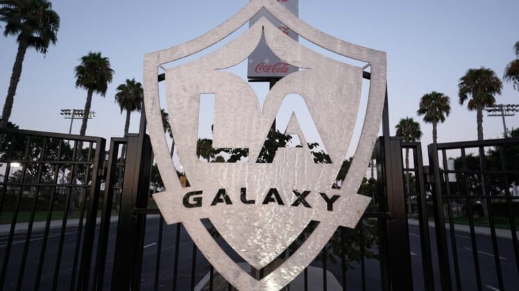 Aug 26, 2020; Carson, California, USA; A general view of LA Galaxy logo at the locked gates at Dignity Health Sports Park after the MLS game against the Seattle Sounders was postponed have been postponed in the wake of protests following the police shooting of Jacob Blake in Kenosha, Wisconsin. Mandatory Credit: Kirby Lee-USA TODAY Sports