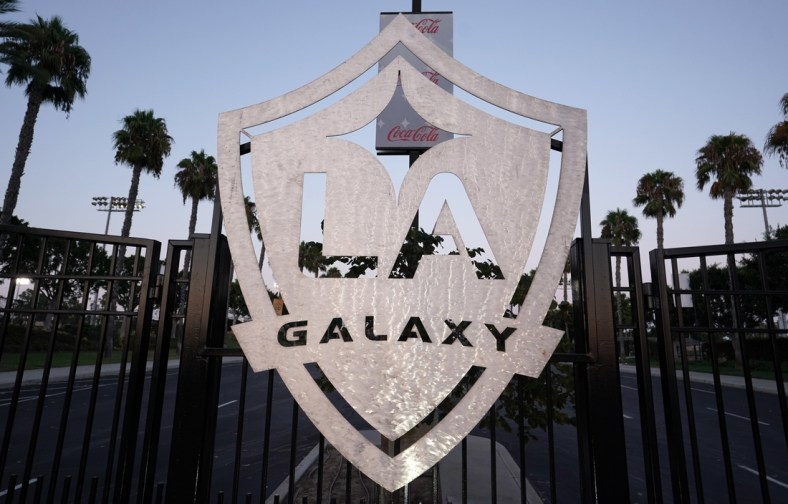Aug 26, 2020; Carson, California, USA; A general view of LA Galaxy logo at the locked gates at Dignity Health Sports Park after the MLS game against the Seattle Sounders was postponed have been postponed in the wake of protests following the police shooting of Jacob Blake in Kenosha, Wisconsin. Mandatory Credit: Kirby Lee-USA TODAY Sports
