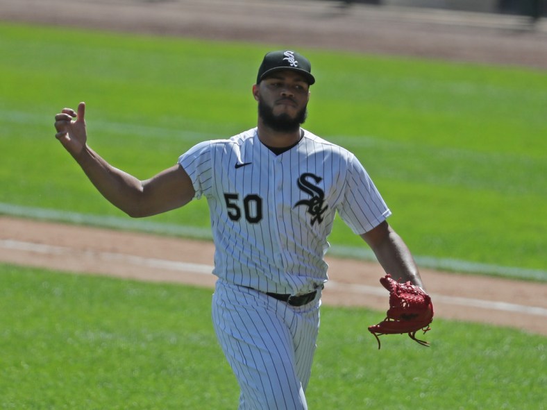 Aug 29, 2020; Chicago, Illinois, USA; Chicago White Sox relief pitcher Jimmy Cordero (50) reacts after getting an inning-ending double play during the fifth inning against the Kansas City Royals at Guaranteed Rate Field. Mandatory Credit: Dennis Wierzbicki-USA TODAY Sports