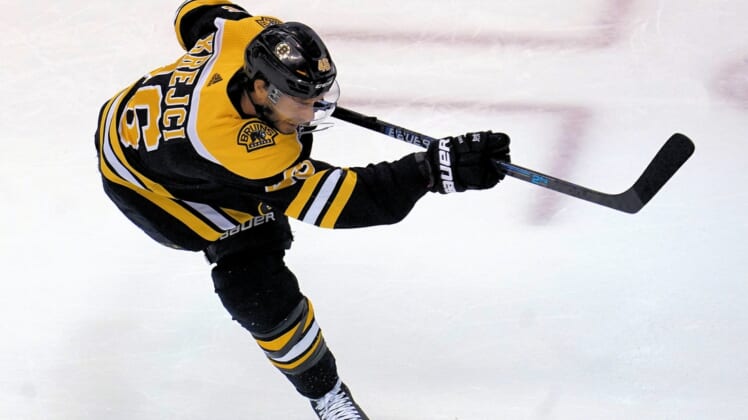 Aug 29, 2020; Toronto, Ontario, CAN; Boston Bruins forward David Krejci (46) shoots the puck during warm up before game four of the second round of the 2020 Stanley Cup Playoffs against the Tampa Bay Lightning at Scotiabank Arena. Mandatory Credit: John E. Sokolowski-USA TODAY Sports