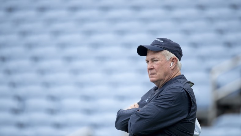 Sept 12, 2020, Chapel Hill, NC, USA; North Carolina head coach Mack Brown watches his team warm up for the Tar Heels' game against Syracuse on Saturday, September 12, 2020 in Chapel Hill, N.C.. Mandatory credit: Robert Willett/Pool Photo via USA TODAY Sports