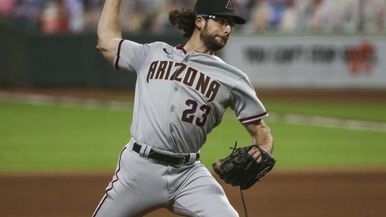 Sep 18, 2020; Houston, Texas, USA; Arizona Diamondbacks starting pitcher Zac Gallen (23) delivers a pitch during the fourth inning against the Houston Astros at Minute Maid Park. Mandatory Credit: Troy Taormina-USA TODAY Sports