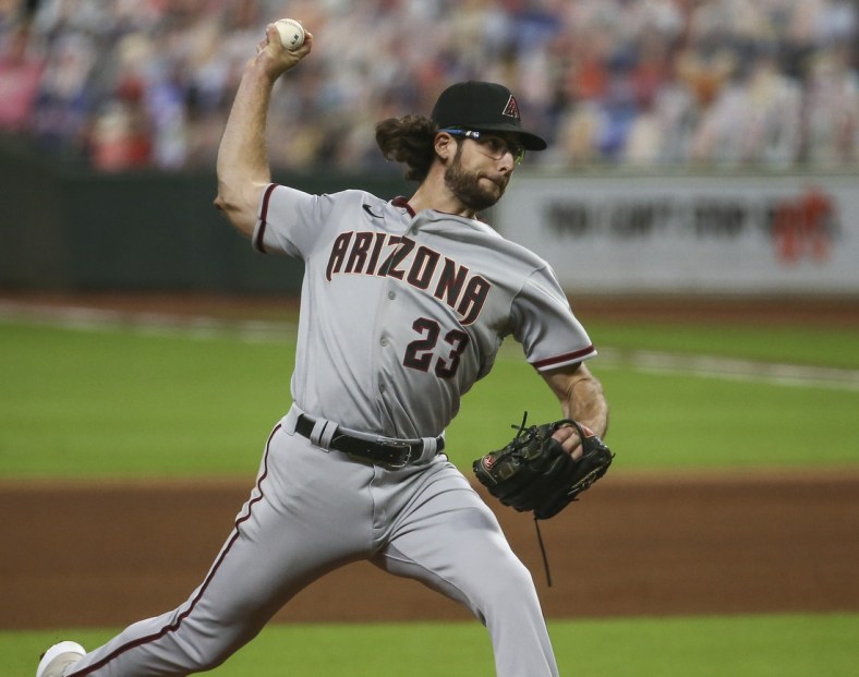 Sep 18, 2020; Houston, Texas, USA; Arizona Diamondbacks starting pitcher Zac Gallen (23) delivers a pitch during the fourth inning against the Houston Astros at Minute Maid Park. Mandatory Credit: Troy Taormina-USA TODAY Sports