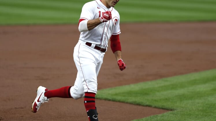 Sep 23, 2020; Cincinnati, Ohio, USA; Cincinnati Reds first baseman Joey Votto (19) reacts as he rounds the bases after hitting a two-run home run against the Milwaukee Brewers during the first inning at Great American Ball Park. Mandatory Credit: David Kohl-USA TODAY Sports