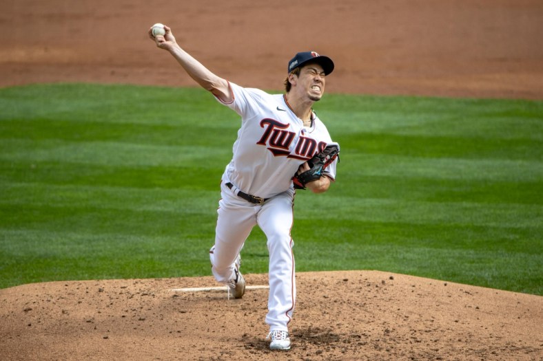 Sep 29, 2020; Minneapolis, Minnesota, USA; (Minnesota Twins starting pitcher Kenta Maeda (18) delivers a pitch in the 3rd inning against the Houston Astros at Target Field. Mandatory Credit: Jesse Johnson-USA TODAY Sports