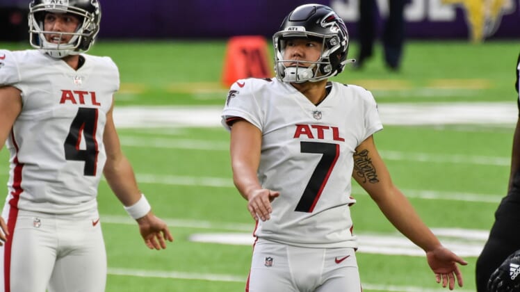 Oct 18, 2020; Minneapolis, Minnesota, USA; Atlanta Falcons kicker Younghoe Koo (7) and punter Sterling Hofrichter (4) in action during the game between the Minnesota Vikings and the Atlanta Falcons at U.S. Bank Stadium. Mandatory Credit: Jeffrey Becker-USA TODAY Sports