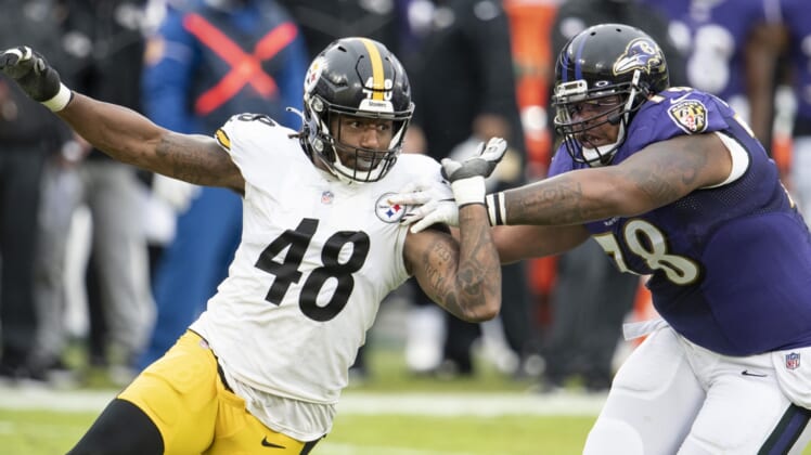 Nov 1, 2020; Baltimore, Maryland, USA;  Pittsburgh Steelers outside linebacker Bud Dupree (48) rushes as Baltimore Ravens offensive tackle Orlando Brown (78) blocks during the first half at M&T Bank Stadium. Mandatory Credit: Tommy Gilligan-USA TODAY Sports