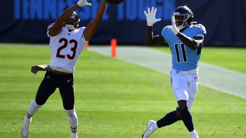 Nov 8, 2020; Nashville, Tennessee, USA; Chicago Bears cornerback Kyle Fuller (23) breaks up a pass intended for Tennessee Titans wide receiver A.J. Brown (11) during the first half at Nissan Stadium. Mandatory Credit: Christopher Hanewinckel-USA TODAY Sports