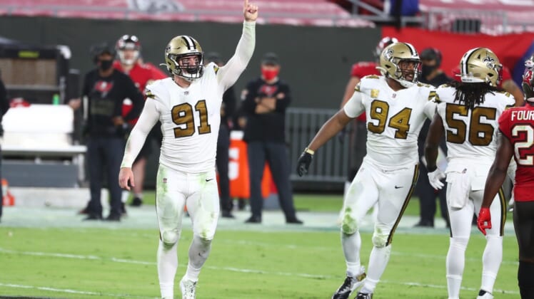 Nov 8, 2020; Tampa, Florida, USA; New Orleans Saints defensive end Trey Hendrickson (91) celebrates as he makes a sack against the Tampa Bay Buccaneers during the second half at Raymond James Stadium. Mandatory Credit: Kim Klement-USA TODAY Sports