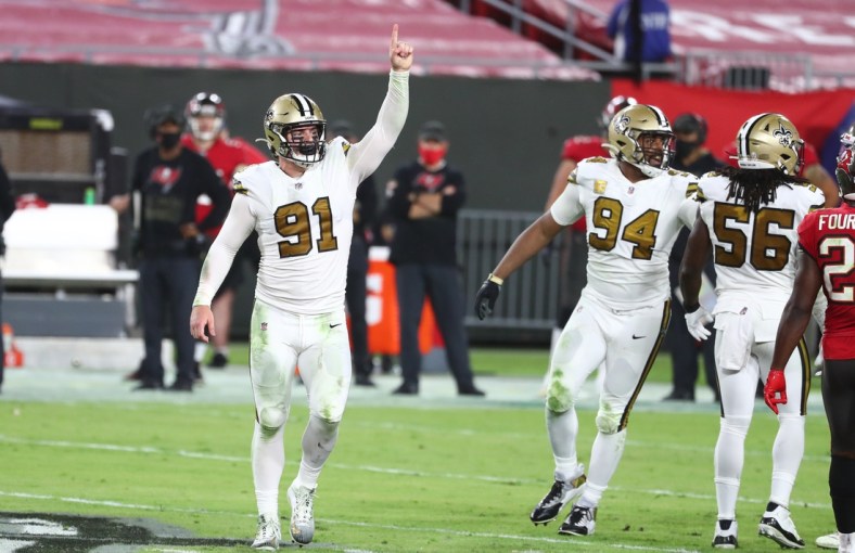 Nov 8, 2020; Tampa, Florida, USA; New Orleans Saints defensive end Trey Hendrickson (91) celebrates as he makes a sack against the Tampa Bay Buccaneers during the second half at Raymond James Stadium. Mandatory Credit: Kim Klement-USA TODAY Sports