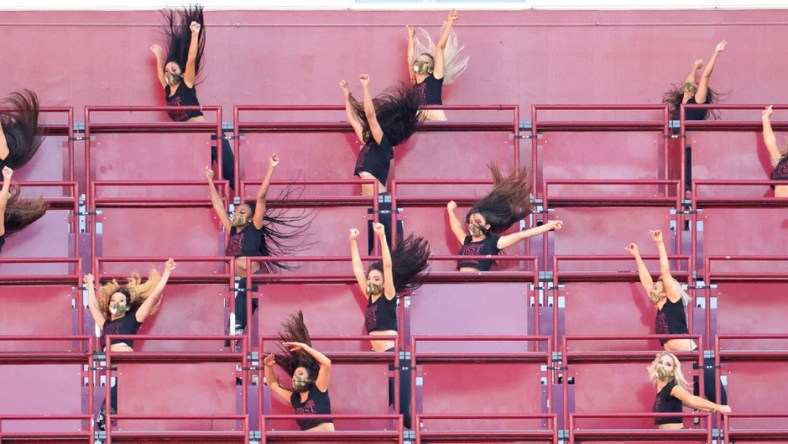 Nov 8, 2020; Landover, Maryland, USA; Members of the Washington Football Team cheerleaders dance in the stands against the New York Giants at FedExField. Mandatory Credit: Geoff Burke-USA TODAY Sports