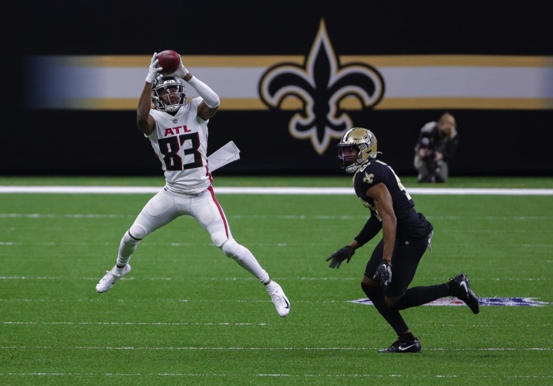 Nov 22, 2020; New Orleans, Louisiana, USA; Atlanta Falcons wide receiver Russell Gage (83) catches a pass against New Orleans Saints free safety Marcus Williams (43) during the second quarter at the Mercedes-Benz Superdome. Mandatory Credit: Derick E. Hingle-USA TODAY Sports