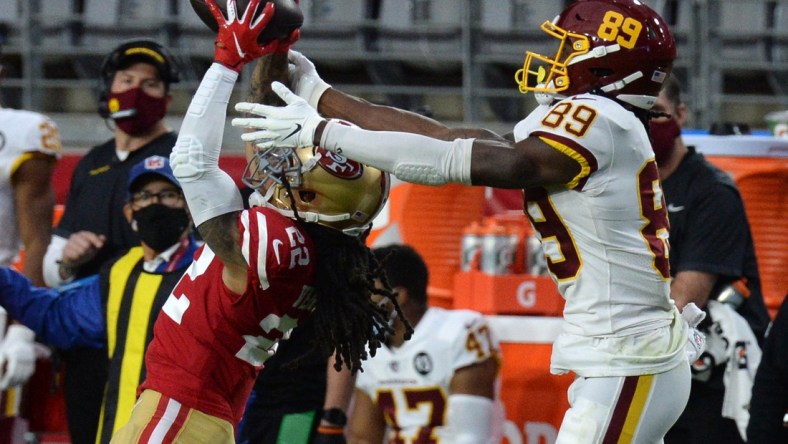 Dec 13, 2020; Glendale, Arizona, USA; San Francisco 49ers cornerback Jason Verrett (22) intercepts a pass intended for Washington Football Team wide receiver Cam Sims (89) during the first half at State Farm Stadium. Mandatory Credit: Joe Camporeale-USA TODAY Sports