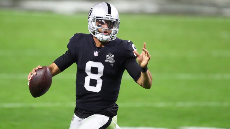 Dec 17, 2020; Paradise, Nevada, USA; Las Vegas Raiders quarterback Marcus Mariota (8) against the Los Angeles Chargers at Allegiant Stadium. Mandatory Credit: Mark J. Rebilas-USA TODAY Sports