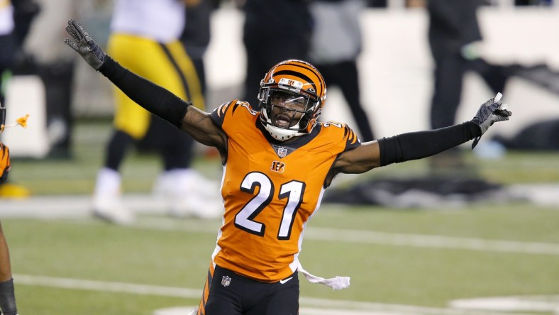 Dec 21, 2020; Cincinnati, Ohio, USA; Cincinnati Bengals cornerback Mackensie Alexander (21) and cornerback William Jackson (22) celebrate as the time winds down on the upset win over Pittsburgh Steelers at Paul Brown Stadium. Mandatory Credit: Joseph Maiorana-USA TODAY Sports