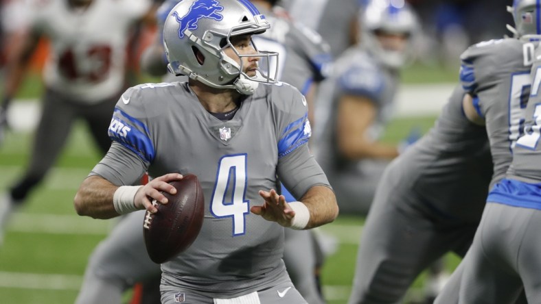 Dec 26, 2020; Detroit, Michigan, USA; Detroit Lions quarterback Chase Daniel (4) drops back to pass against the Tampa Bay Buccaneers during the second quarter at Ford Field. Mandatory Credit: Raj Mehta-USA TODAY Sports