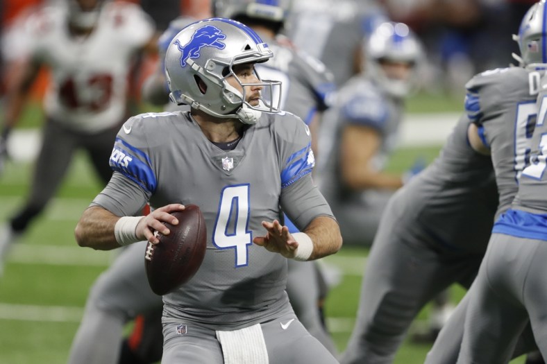 Dec 26, 2020; Detroit, Michigan, USA; Detroit Lions quarterback Chase Daniel (4) drops back to pass against the Tampa Bay Buccaneers during the second quarter at Ford Field. Mandatory Credit: Raj Mehta-USA TODAY Sports