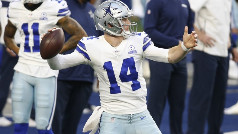 Dec 27, 2020; Arlington, Texas, USA; Dallas Cowboys quarterback Andy Dalton (14) throws a pass before the game against the Philadelphia Eagles at AT&T Stadium. Mandatory Credit: Tim Heitman-USA TODAY Sports