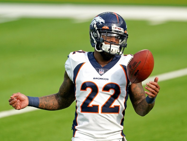 Dec 27, 2020; Inglewood, California, USA; Denver Broncos strong safety Kareem Jackson (22) tosses a football around prior to the game against the Los Angeles Chargers at SoFi Stadium. Mandatory Credit: Kirby Lee-USA TODAY Sports
