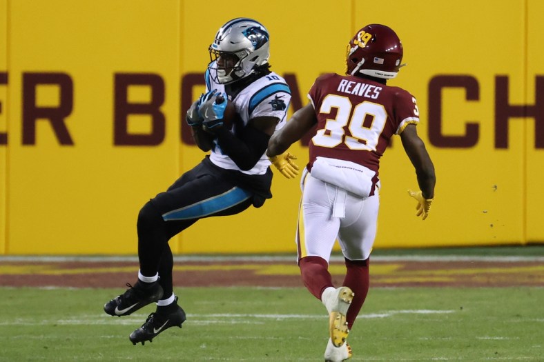 Dec 27, 2020; Landover, Maryland, USA; Carolina Panthers wide receiver Curtis Samuel (10) catches a pass as Washington Football Team defensive back Jeremy Reaves (39) in the second quarter at FedExField. Mandatory Credit: Geoff Burke-USA TODAY Sports