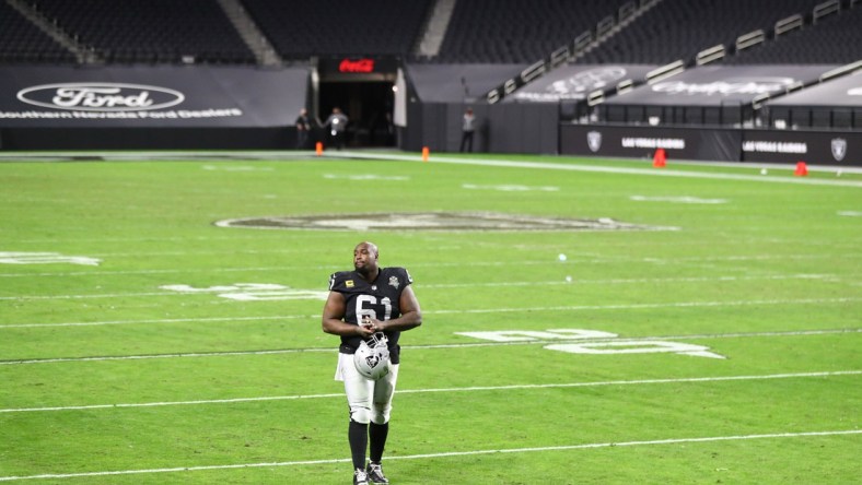 Dec 26, 2020; Paradise, Nevada, USA; Las Vegas Raiders center Rodney Hudson (61) reacts as he walks off the field following the game against the Miami Dolphins at Allegiant Stadium. Mandatory Credit: Mark J. Rebilas-USA TODAY Sports