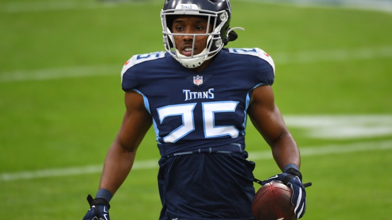 Dec 20, 2020; Nashville, Tennessee, USA; Tennessee Titans cornerback Adoree' Jackson (25) warms up before the game against the Detroit Lions at Nissan Stadium. Mandatory Credit: Christopher Hanewinckel-USA TODAY Sports