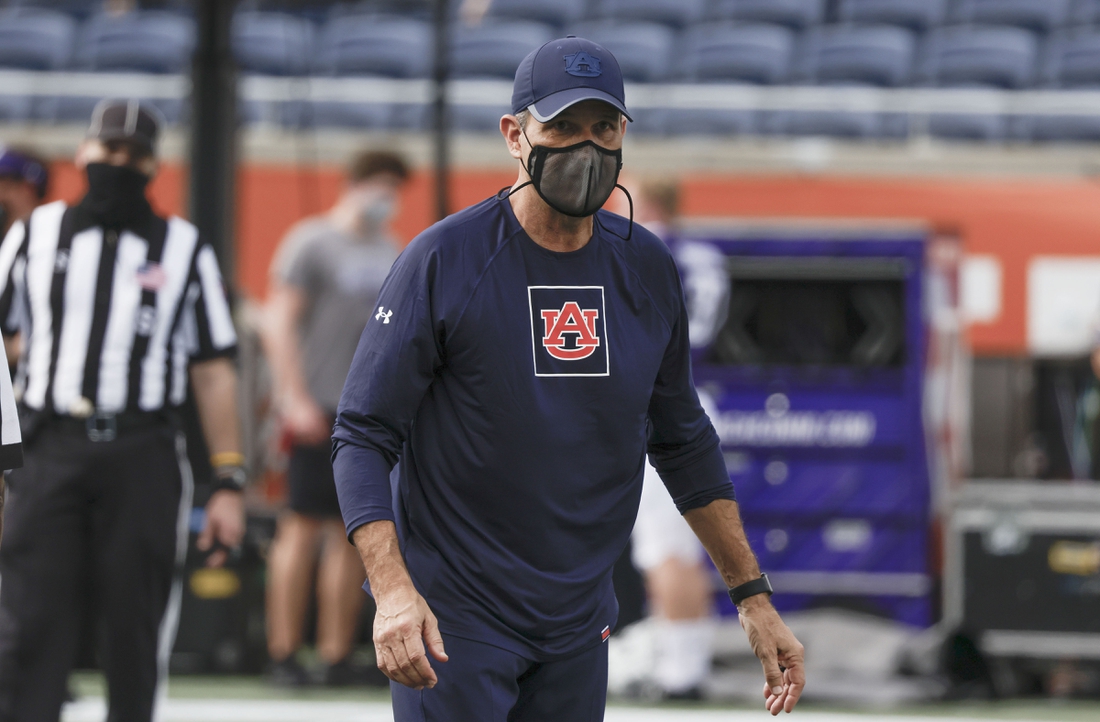 Jan 1, 2021; Orlando, FL, USA; Auburn Tigers interim head coach Kevin Steele walks on the field before the game against the Northwestern Wildcats at Camping World Stadium. Mandatory Credit: Reinhold Matay-USA TODAY Sports