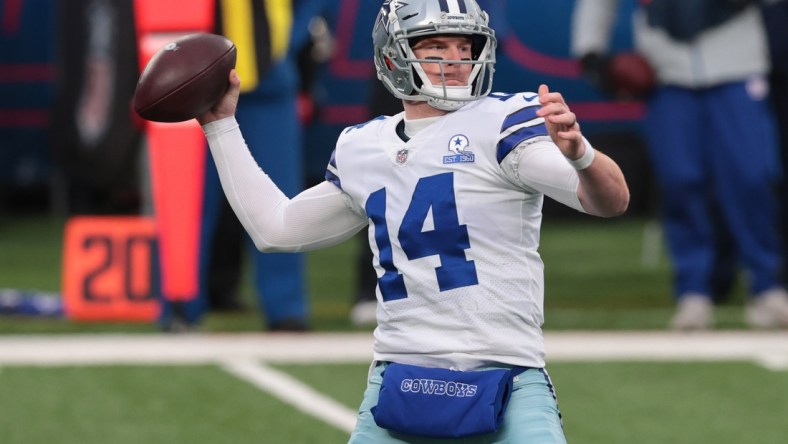 Jan 3, 2021; East Rutherford, NJ, USA; Dallas Cowboys quarterback Andy Dalton (14) throws a pass against the New York Giants in the first half at MetLife Stadium. Mandatory Credit: Vincent Carchietta-USA TODAY Sports