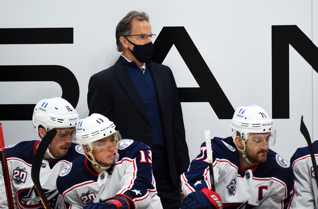 Jan 14, 2021; Nashville, Tennessee, USA; Columbus Blue Jackets head coach John Tortorella looks on from the bench during the first period against the Nashville Predators at Bridgestone Arena. Mandatory Credit: Christopher Hanewinckel-USA TODAY Sports