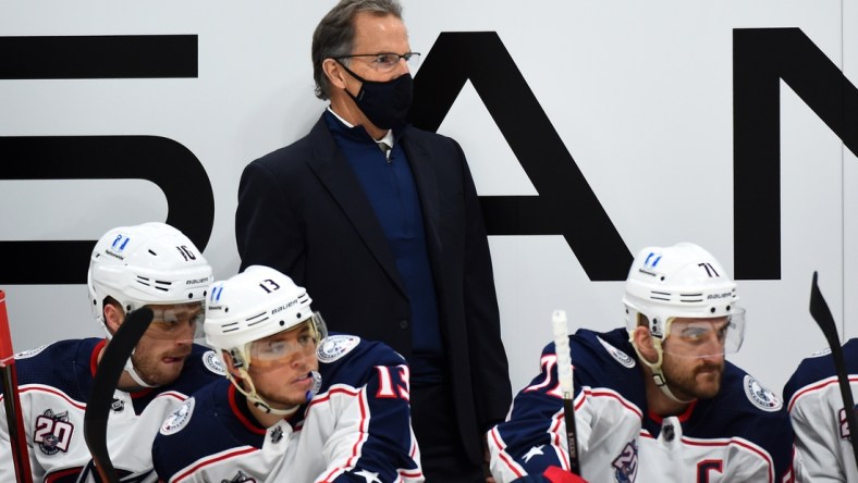 Jan 14, 2021; Nashville, Tennessee, USA; Columbus Blue Jackets head coach John Tortorella looks on from the bench during the first period against the Nashville Predators at Bridgestone Arena. Mandatory Credit: Christopher Hanewinckel-USA TODAY Sports