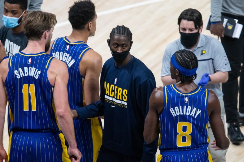 Jan 20, 2021; Indianapolis, Indiana, USA; Indiana Pacers guard Caris LeVert (22) during a timeout  in the fourth quarter against the Dallas Mavericks at Bankers Life Fieldhouse. Mandatory Credit: Trevor Ruszkowski-USA TODAY Sports