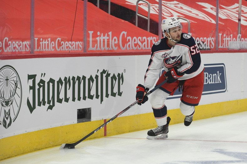 Jan 18, 2021; Detroit, Michigan, USA; Columbus Blue Jackets center Emil Bemstrom (52) during the game against the Detroit Red Wings at Little Caesars Arena. Mandatory Credit: Tim Fuller-USA TODAY Sports