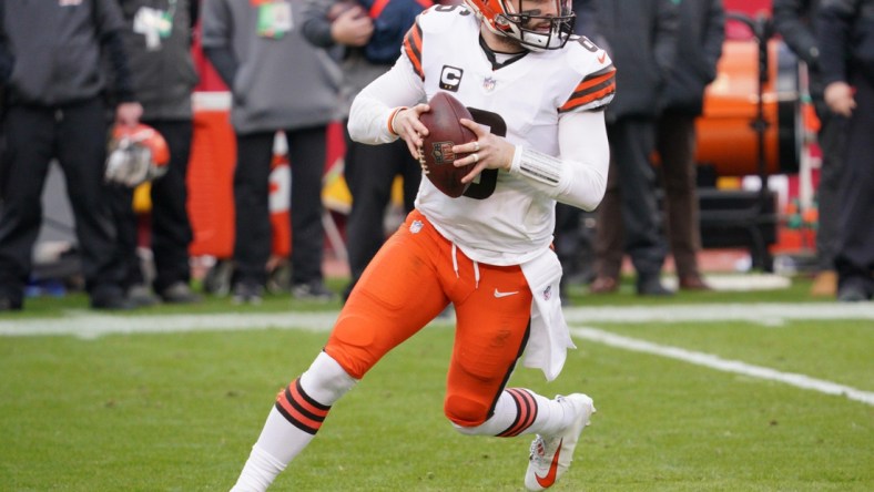 Jan 17, 2021; Kansas City, Missouri, USA; Cleveland Browns quarterback Baker Mayfield (6) drops back to pass during the AFC Divisional Round playoff game against the Kansas City Chiefs at Arrowhead Stadium. Mandatory Credit: Denny Medley-USA TODAY Sports