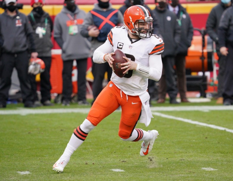 Jan 17, 2021; Kansas City, Missouri, USA; Cleveland Browns quarterback Baker Mayfield (6) drops back to pass during the AFC Divisional Round playoff game against the Kansas City Chiefs at Arrowhead Stadium. Mandatory Credit: Denny Medley-USA TODAY Sports