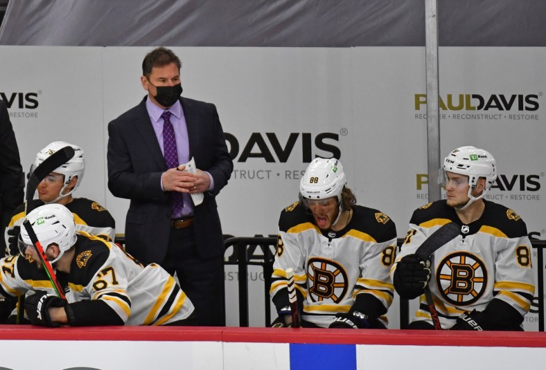 Feb 5, 2021; Philadelphia, Pennsylvania, USA; Boston Bruins head coach Bruce Cassidy bending the bench against the Philadelphia Flyers during the third period at Wells Fargo Center. Mandatory Credit: Eric Hartline-USA TODAY Sports