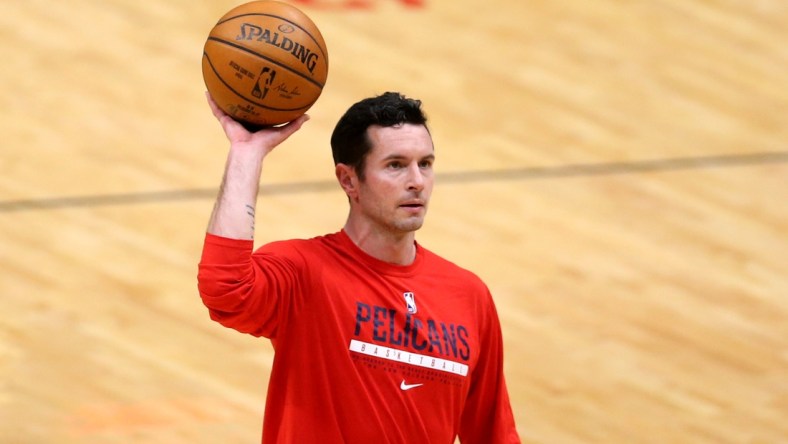 Feb 6, 2021; New Orleans, Louisiana, USA; New Orleans Pelicans guard JJ Redick (4) warms up before the game against the Memphis Grizzlies at the Smoothie King Center. Mandatory Credit: Chuck Cook-USA TODAY Sports