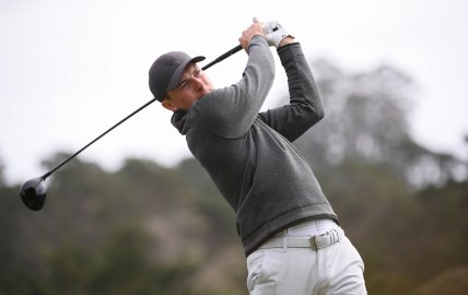 Feb 14, 2021; Pebble Beach, California, USA; Jordan Spieth plays his shot from the third tee during the final round of the AT&T Pebble Beach Pro-Am golf tournament at Pebble Beach Golf Links. Mandatory Credit: Orlando Ramirez-USA TODAY Sports