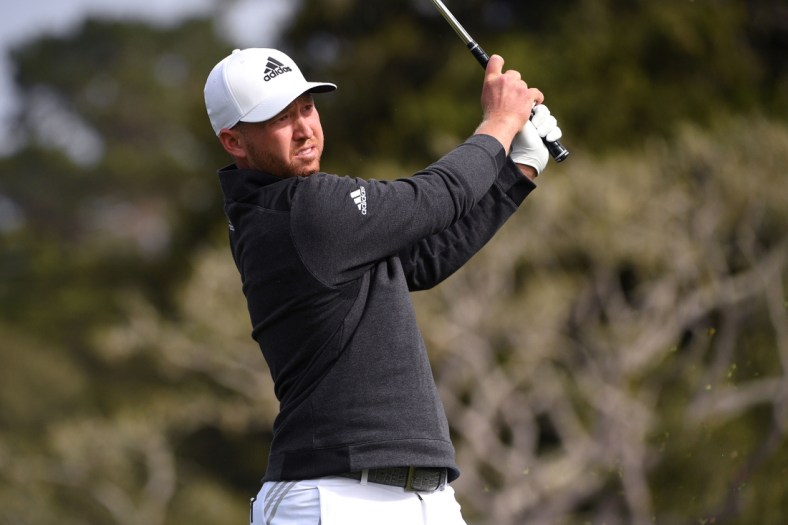 Feb 14, 2021; Pebble Beach, California, USA; Daniel Berger plays his shot from the 16th tee during the final round of the AT&T Pebble Beach Pro-Am golf tournament at Pebble Beach Golf Links. Mandatory Credit: Orlando Ramirez-USA TODAY Sports