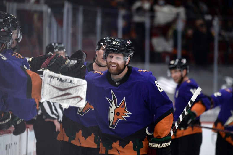 Feb 20, 2021; Glendale, Arizona, USA; Arizona Coyotes right wing Phil Kessel (81) celebrates a goal against the Los Angeles Kings during the third period at Gila River Arena. Mandatory Credit: Joe Camporeale-USA TODAY Sports