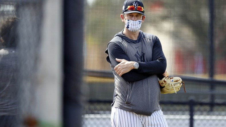 Feb 25, 2021; Tampa, Florida, USA; New York Yankees manager Aaron Boone (17) looks on during spring training at the Yankees player development complex. Mandatory Credit: Kim Klement-USA TODAY Sports