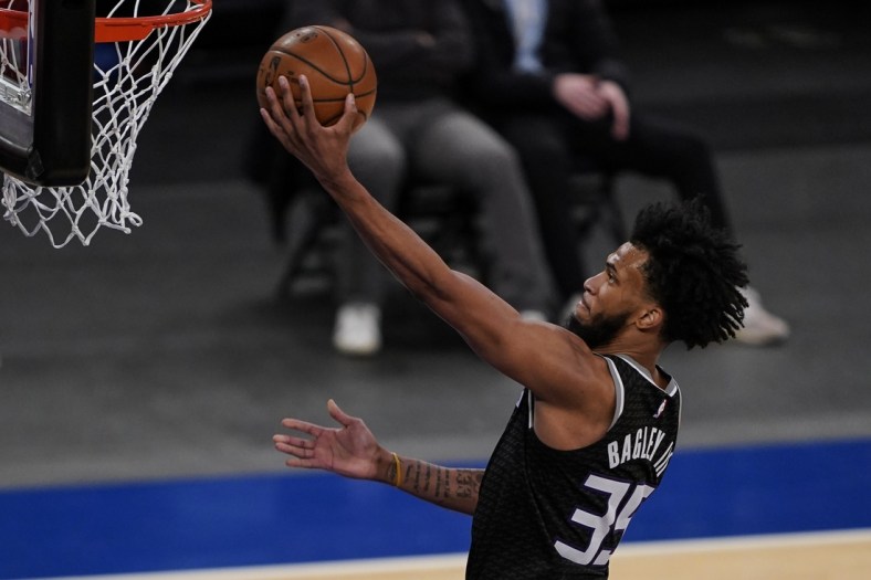 Feb 25, 2021; New York, New York, USA; Sacramento Kings forward Marvin Bagley III (35) shoots against the New York Knicks  in the first half at Madison Square Garden. Mandatory Credit:  John Minchillo/POOL PHOTOS-USA TODAY Sports