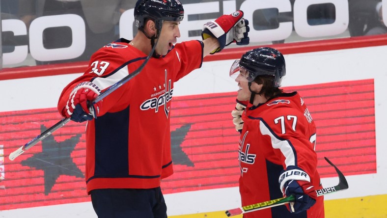 Feb 25, 2021; Washington, District of Columbia, USA; Washington Capitals defenseman Zdeno Chara (33) celebrates with Capitals right wing T.J. Oshie (77) after their game against the Pittsburgh Penguins at Capital One Arena. Mandatory Credit: Geoff Burke-USA TODAY Sports