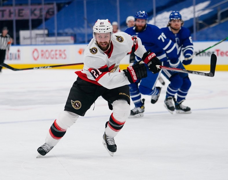 Feb 17, 2021; Toronto, Ontario, CAN; Ottawa Senators forward Derek Stepan (21) skates against the Toronto Maple Leafs at Scotiabank Arena. Toronto defeated Ottawa 2-1. Mandatory Credit: John E. Sokolowski-USA TODAY Sports