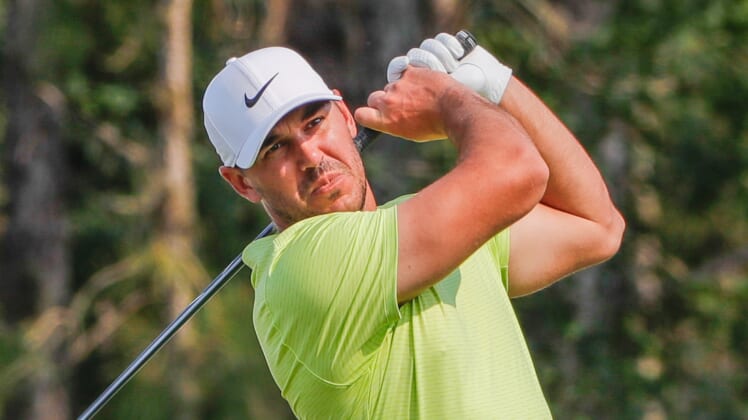 Feb 27, 2021; Bradenton, Florida,  USA; Brooks Koepka plays his shot from the third tee during the third round of World Golf Championships at The Concession golf tournament at The Concession Golf Club. Mandatory Credit: Mike Watters-USA TODAY Sports
