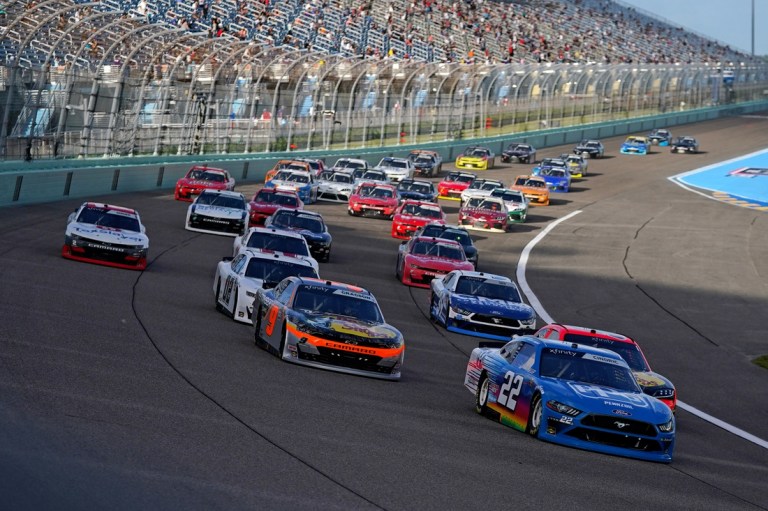 Feb 27, 2021; Miami, FL, USA; NASCAR Xfinity Series driver Austin Cindric (22) leads the field to restart the Contender Boats 250 at Homestead-Miami Speedway. Mandatory Credit: Jasen Vinlove-USA TODAY Sports