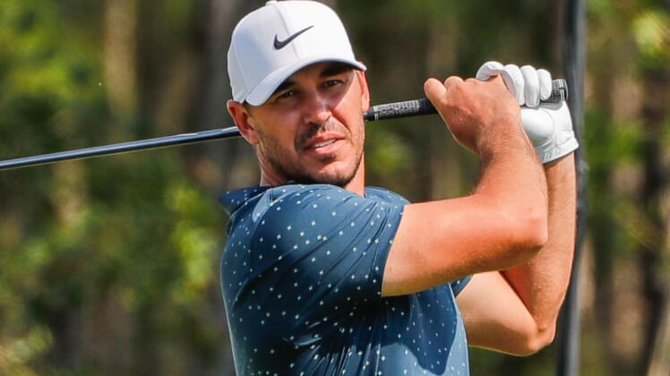 Feb 28, 2021; Bradenton, Florida, USA; Brooks Koepka plays his shot from the third tee during the final round of World Golf Championships at The Concession golf tournament at The Concession Golf Club. Mandatory Credit: Mike Watters-USA TODAY Sports